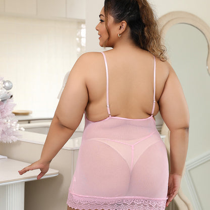 Woman wearing a pink lingerie set in a bathroom setting