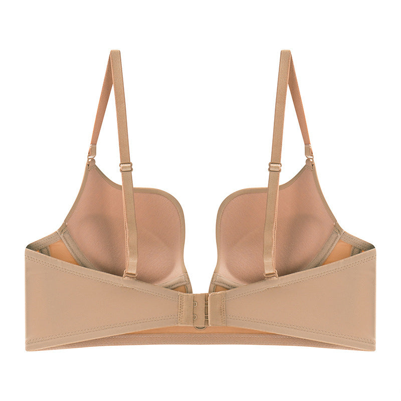 Beige bra on a white background