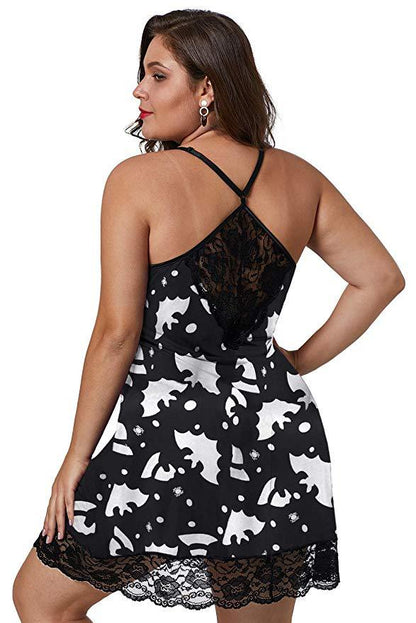 Woman wearing a black lace nightgown with white cat pattern