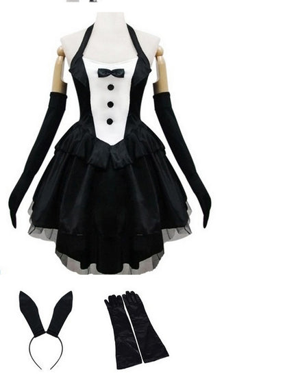 Black and white tuxedo-style dress with accessories on a mannequin against a white background