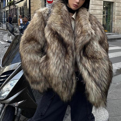 Person wearing a fur coat on a city street