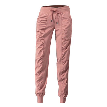 Pink jogger pants on a white background