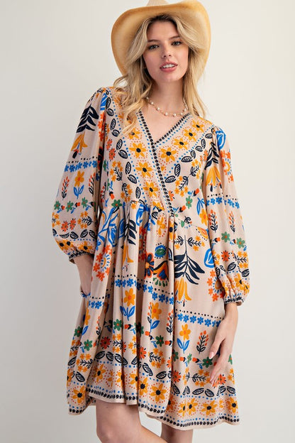 Woman wearing a floral dress with a plain background