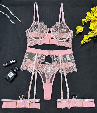 Plus size woman wearing purple mesh embroidered lingerie set front view