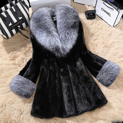 Black Close-up of plush faux mink hair and large fox-style collar on plus size coat