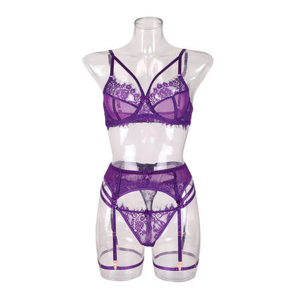 “Full view of French lace purple lingerie set including bralette and thong”