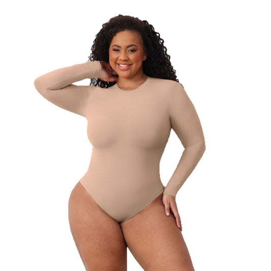 Plus size woman wearing long sleeve shapewear jumpsuit