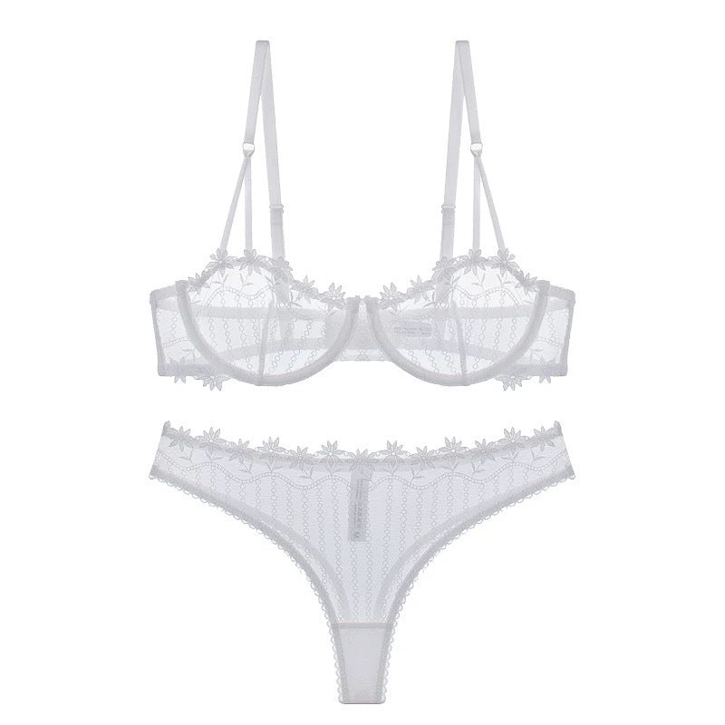 Close-up of embroidered lace and minimizer design for large chest support