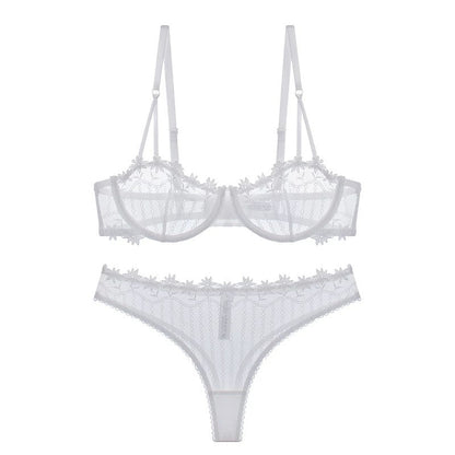 Close-up of embroidered lace and minimizer design for large chest support