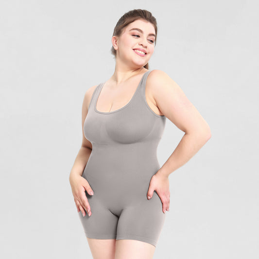 Plus size woman wearing one-piece shapewear bodysuit