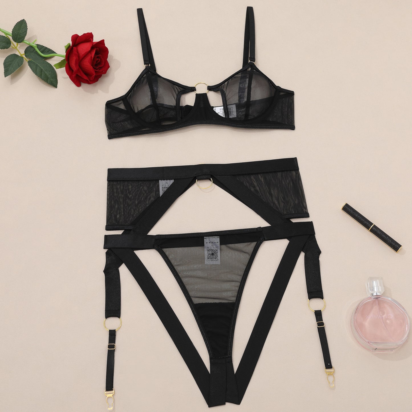 “Close-up of lace and mesh fabric on sexy lingerie set with garter belt”