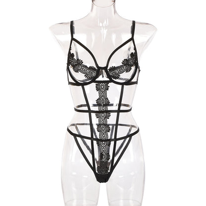 “Close-up of perspective tape and soft lace fabric on erotic bodysuit lingerie”