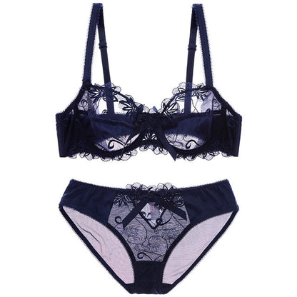 Close-up of floral embroidery on sheer mesh bra