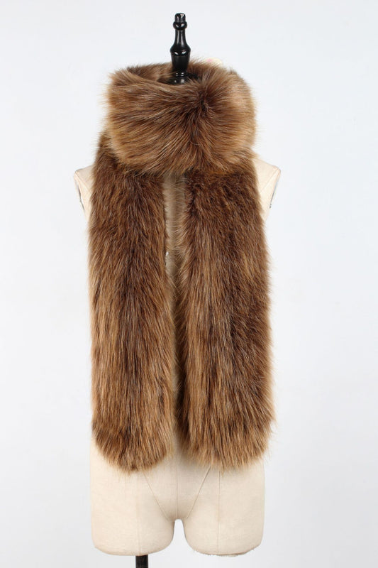 Brown fur vest on a mannequin against a white background