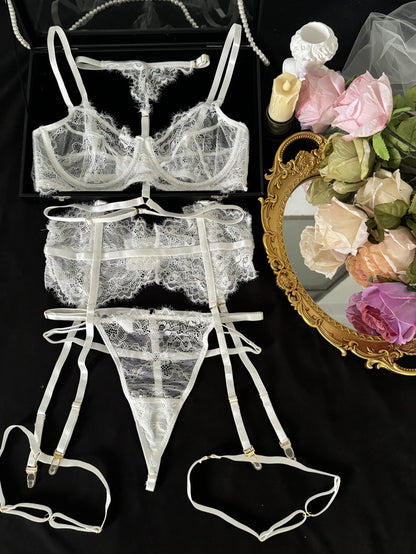 “Close-up of lace trim and push-up detailing on purple halter lingerie set”