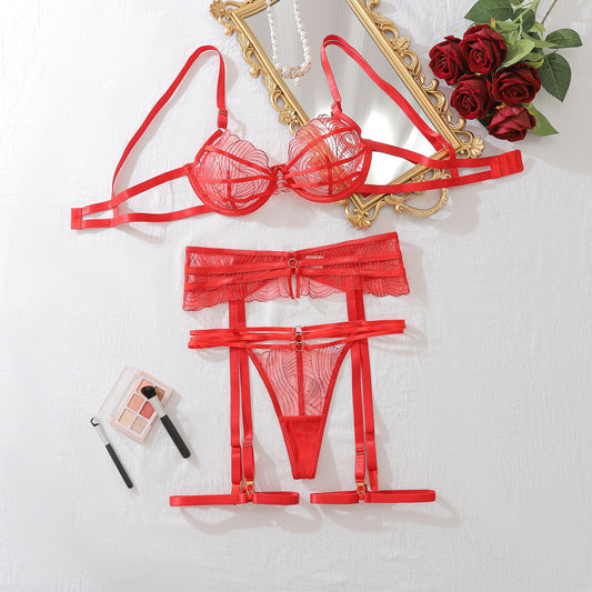 “red embroidered mesh bra with gathered cups and adjustable straps”