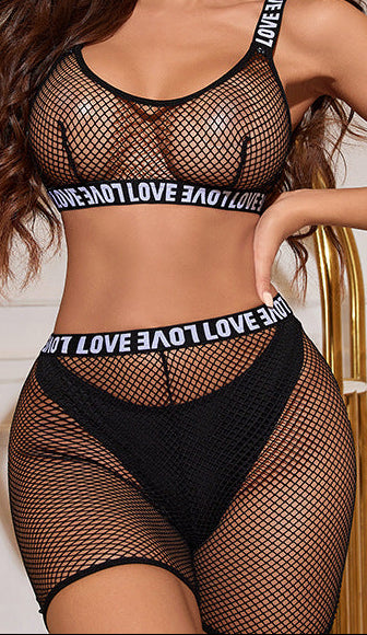 “Front view of mesh hollow-out lingerie with English shoulder straps and matching panties”