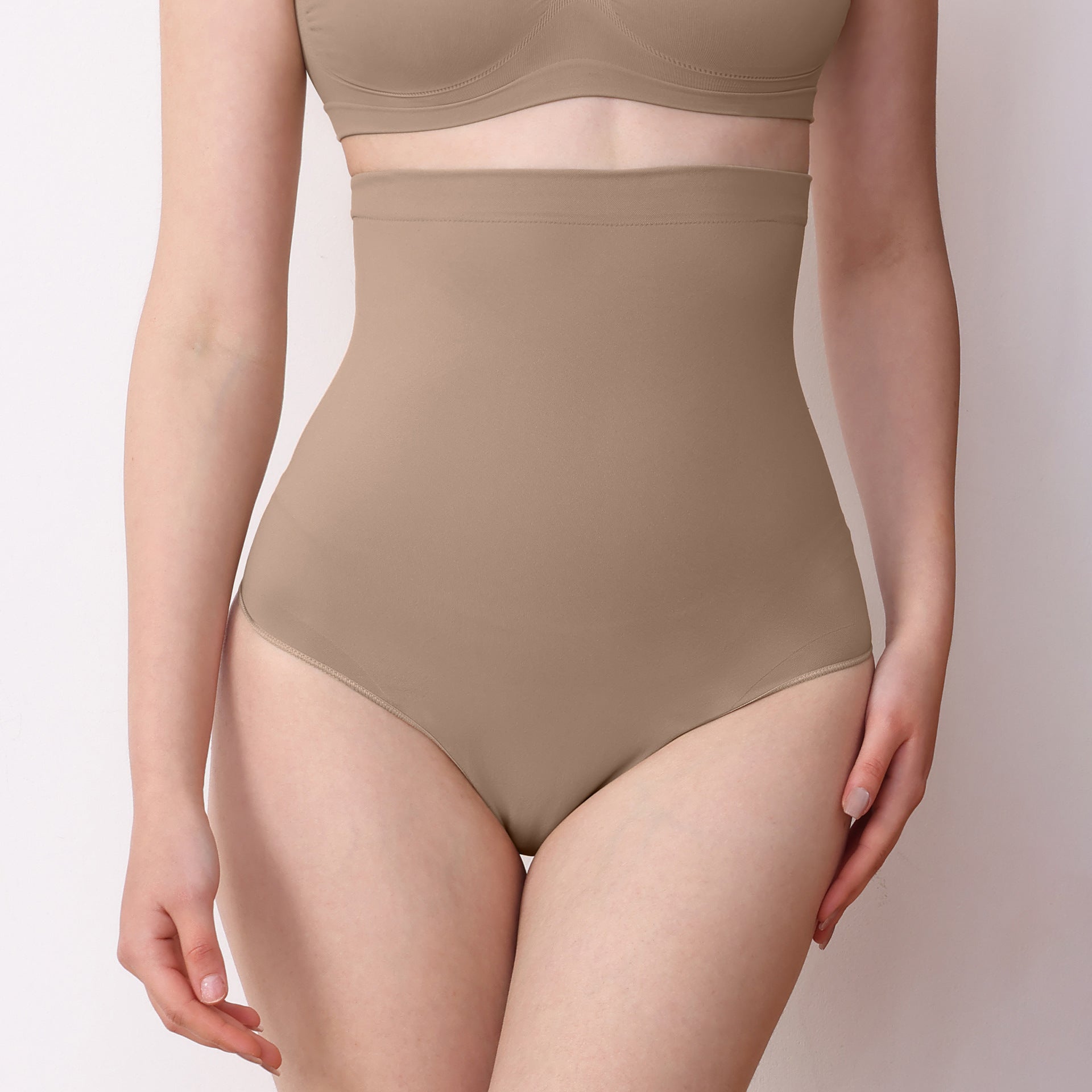 Side view showing tummy control and post-baby belly shaping