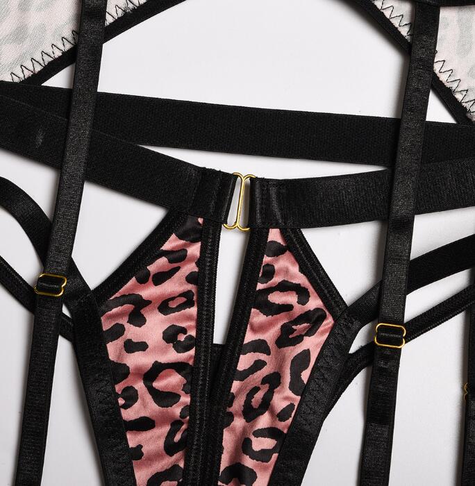 “Close-up of leopard print stitching and buckle accents on sexy lingerie 