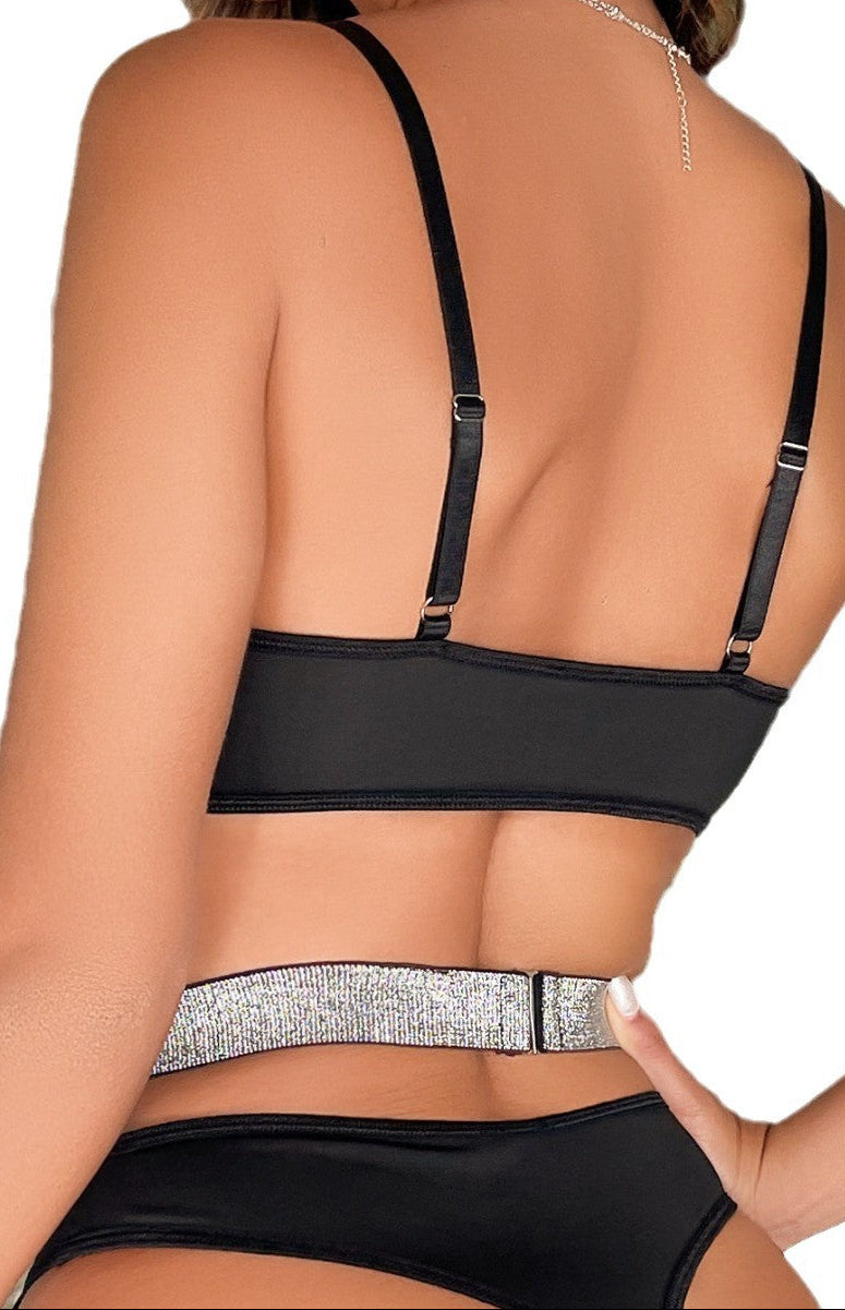 “Flirty erotic bodysuit lingerie highlighting curves and confidence”