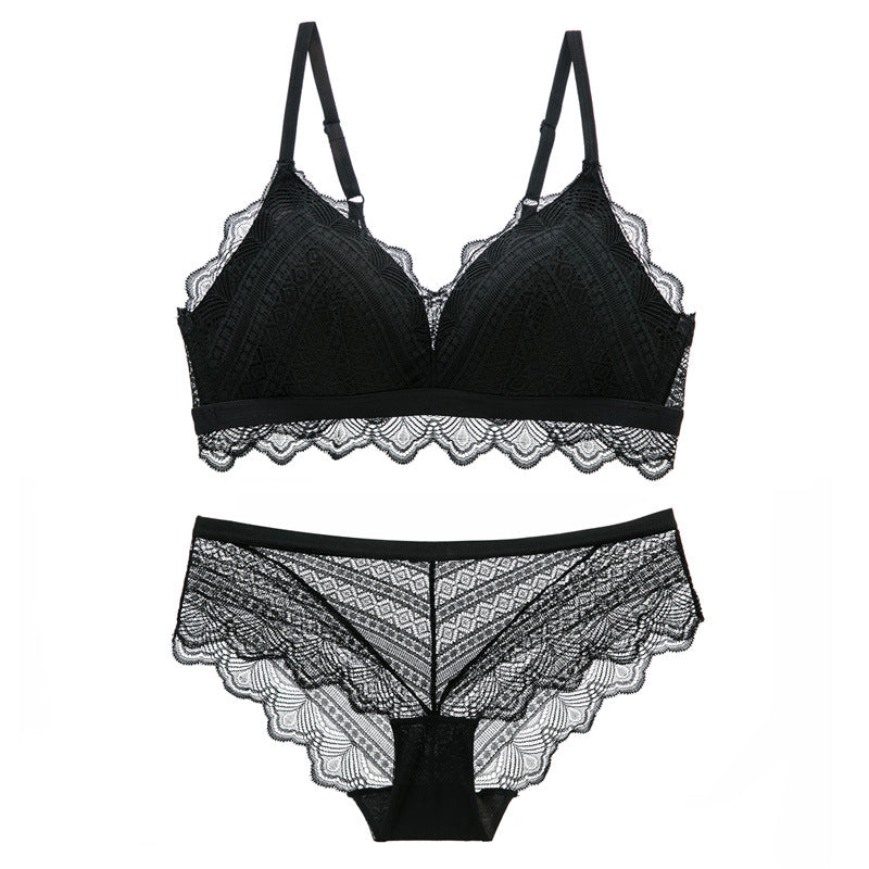 “Close-up of embroidered lace accents on women’s white bra and panty lingerie set”