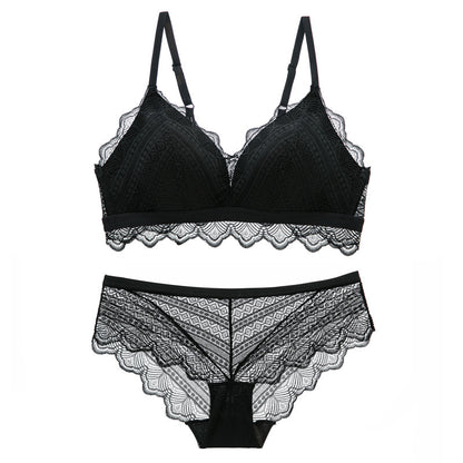 “Close-up of embroidered lace accents on women’s white bra and panty lingerie set”