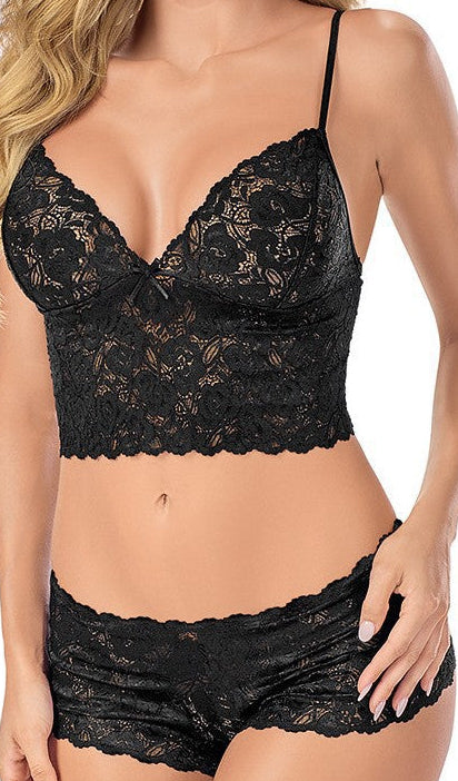 Plus size model wearing see-through lace lingerie suit for curvy women