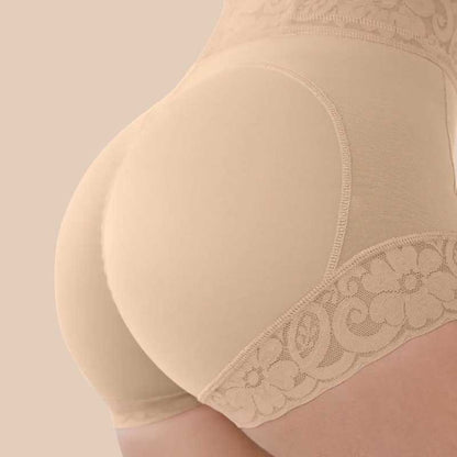 Curvy woman wearing high-waist body shaping leggings for tummy and hip enhancement