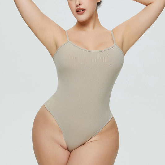Plus size woman wearing ribbed V-neck triangle romper