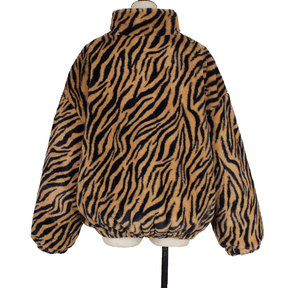 Zebra print jacket on a mannequin against a white background