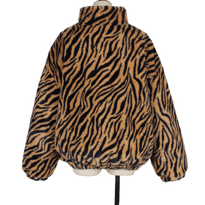 Zebra print jacket on a mannequin against a white background