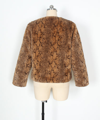 Brown snake print jacket on a mannequin against a white background