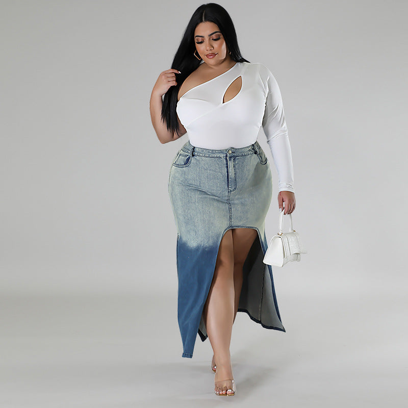 Woman wearing a white top and denim skirt on a gray background plus size denim woven gradient split skirt women jeans in trend