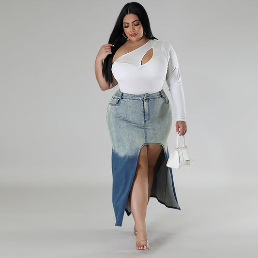 Woman wearing a white top and denim skirt on a gray background plus size denim woven gradient split skirt women jeans in trend