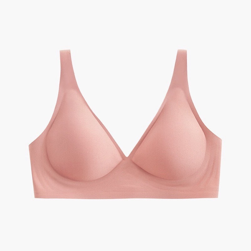 Pink bra on a light gray background