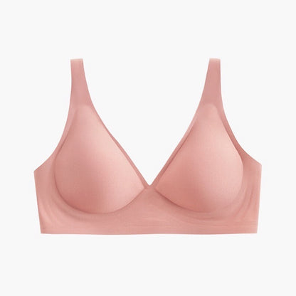Pink bra on a light gray background