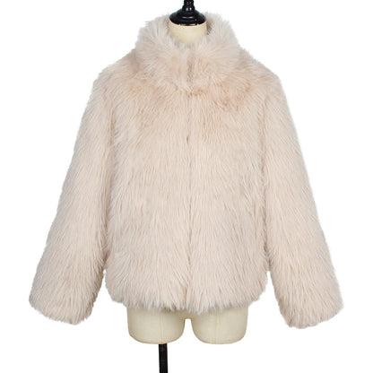 Beige fluffy jacket on a mannequin against a white background