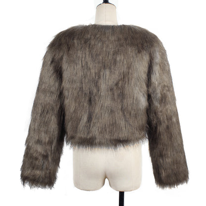 Brown fur jacket on a mannequin against a white background