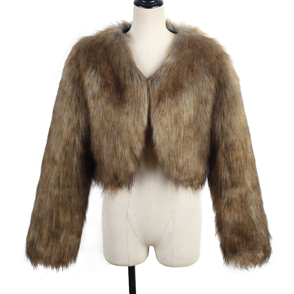 Brown fur jacket on a mannequin against a white background