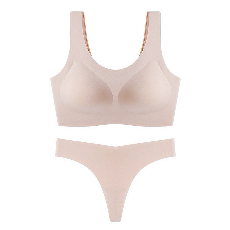 Beige bra and panties set on a white background