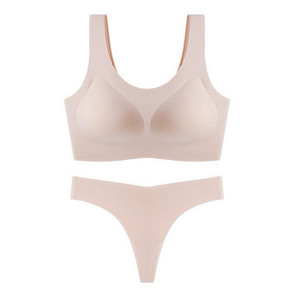 Beige bra and panties set on a white background