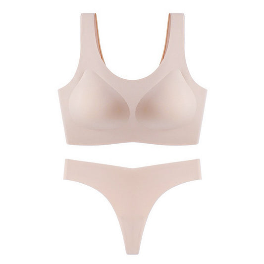 Beige bra and panties set on a white background