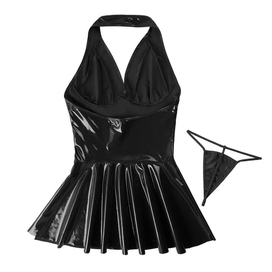 Black halter top and pleated skirt with a matching thong on a white background