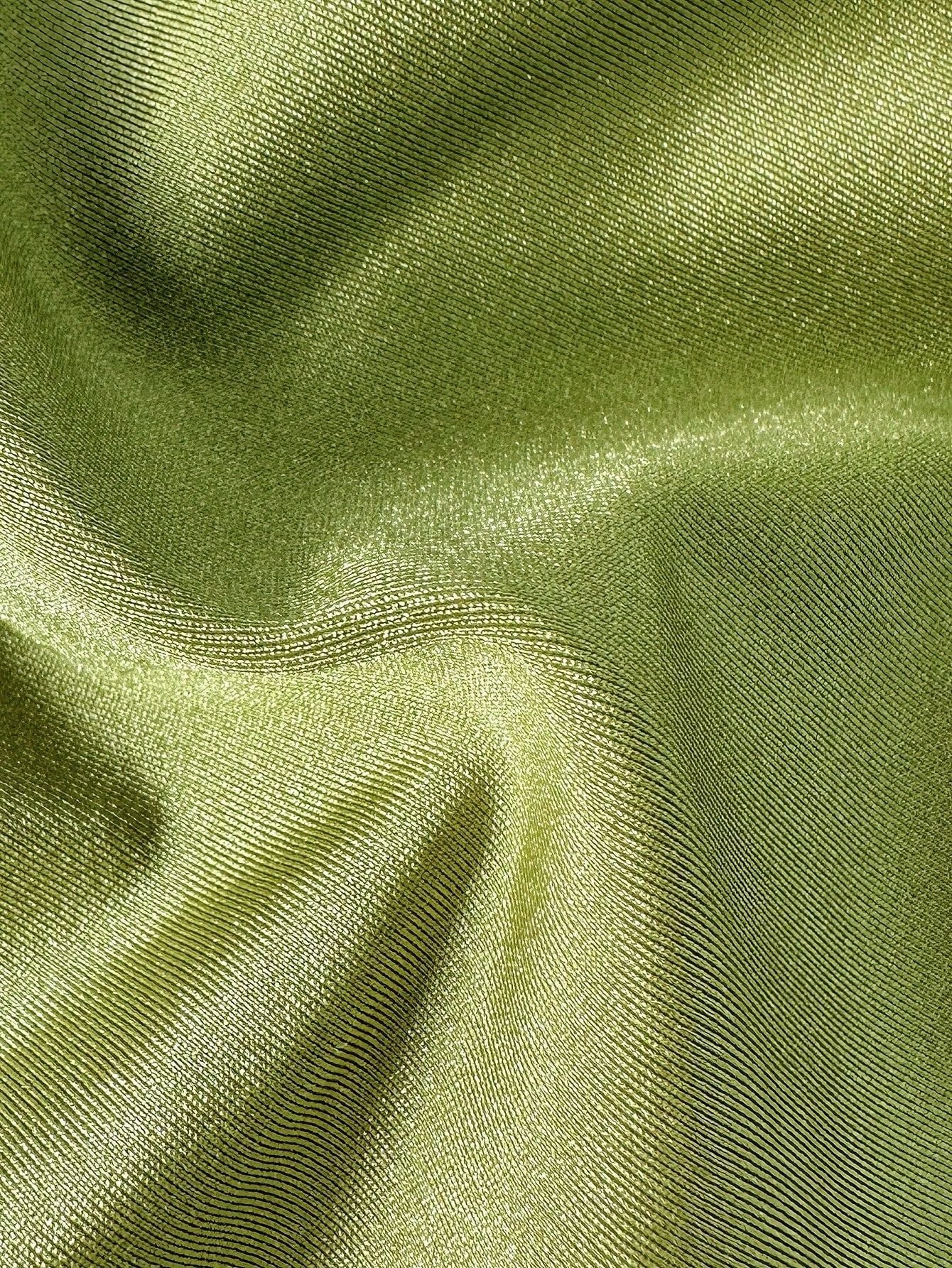Close-up of green fabric with visible texture