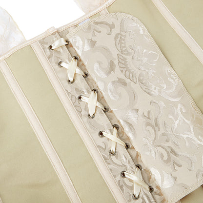 Close-up of a white lace corset with decorative lacing on a light green background