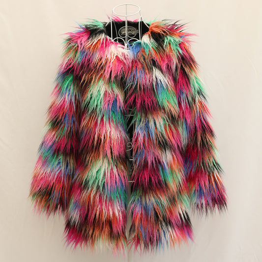 Multicolored fur vest on a hanger against a beige background