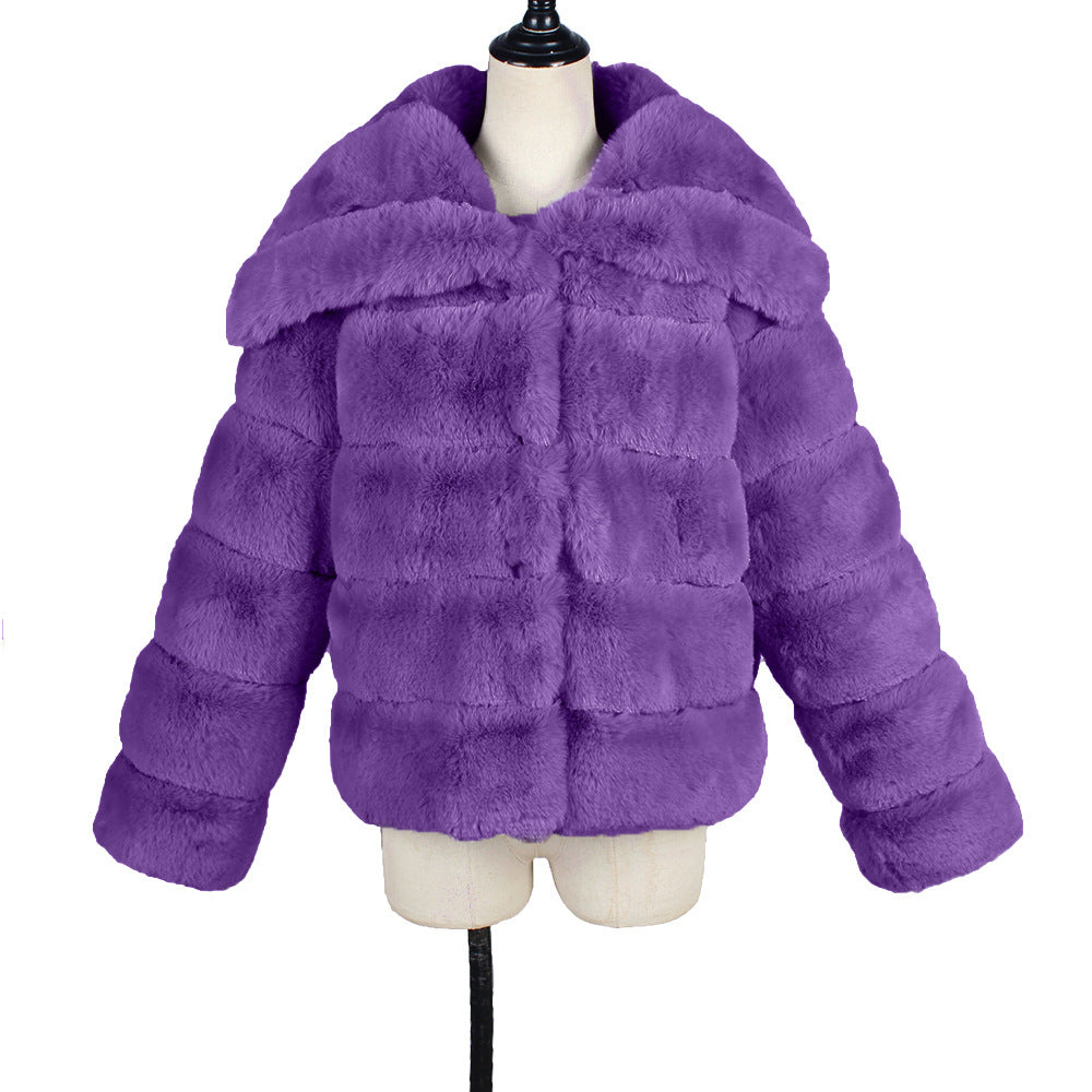 Purple fur coat on a mannequin against a white background