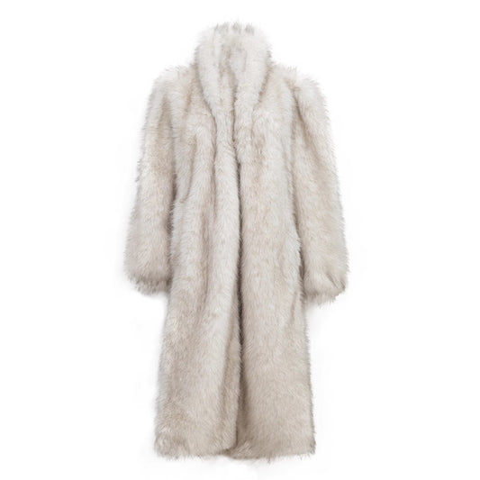 Close-up of plush raccoon-style faux fur and large fox collar on plus size coat