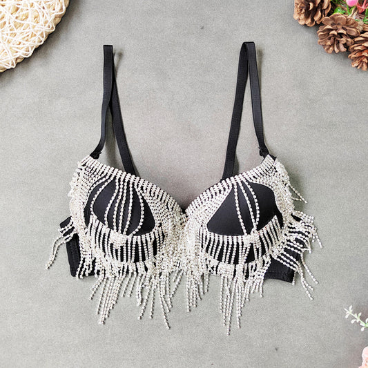 Black bra with white beaded fringe on a gray background