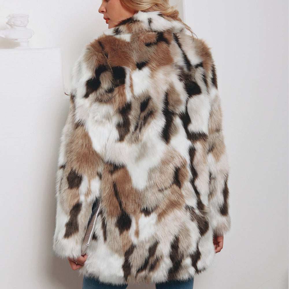 Fur coat with a pattern of white, brown, and black on a plain background